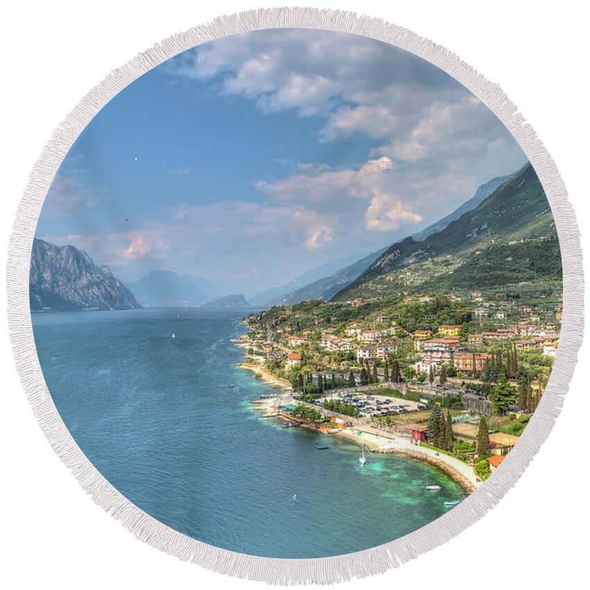 Architecture Round Beach Towel featuring the photograph view over the Lake Garda with the charming village Malcesine #3 by Gina Koch
