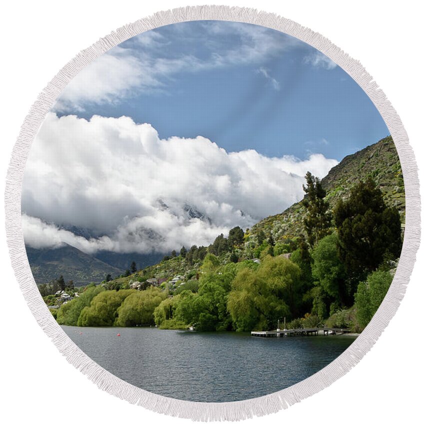 Queenstown New Zealand. Remarkable Ranges And Lake Wakatipu. This Water Is So Pure That It Even Does Not Conduct Electricity. Round Beach Towel featuring the photograph Queenstown New Zealand. Remarkable ranges and lake Wakatipu. #4 by Yurix Sardinelly