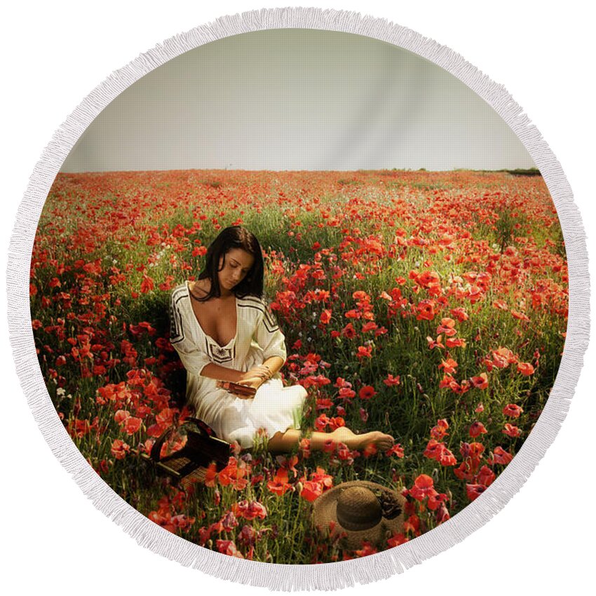 Portrait. Poppies Round Beach Towel featuring the photograph A girl reading amongst he Poppies by Mark Egerton