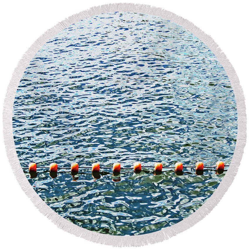 A Round Beach Towel featuring the photograph A Line To Cross by Tinto Designs