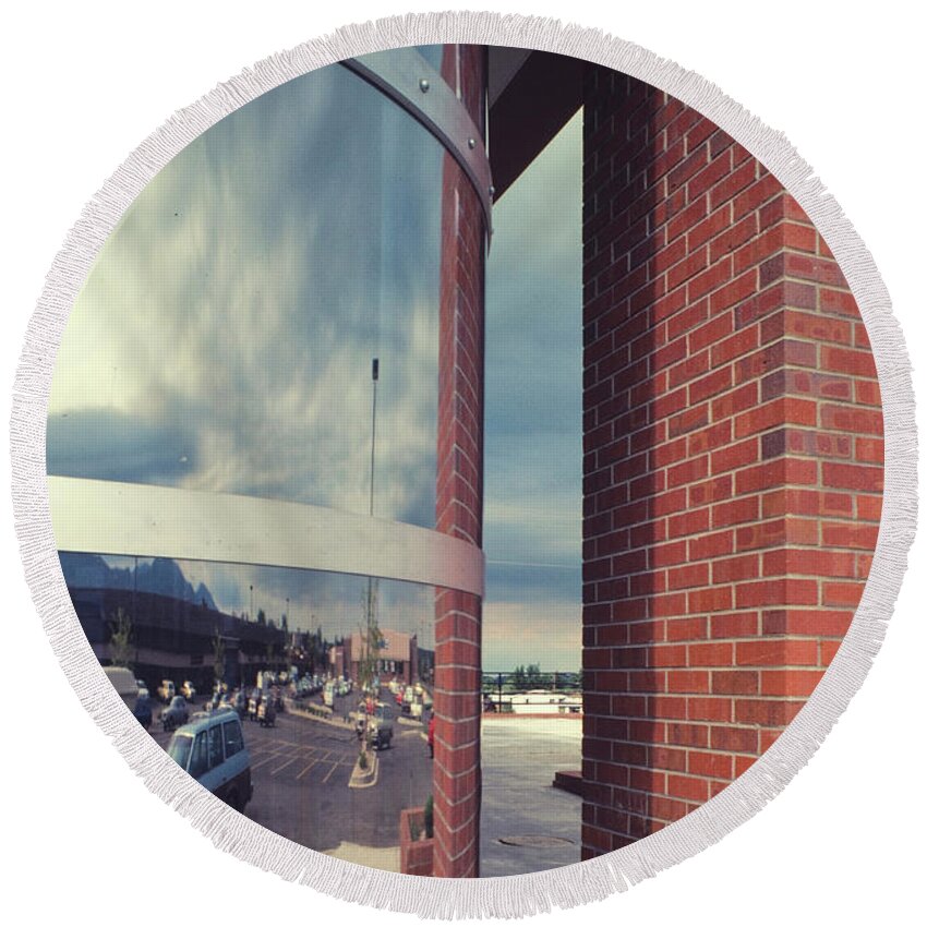 Photography Round Beach Towel featuring the photograph A Slit In The Brick Wall by Marc Nader