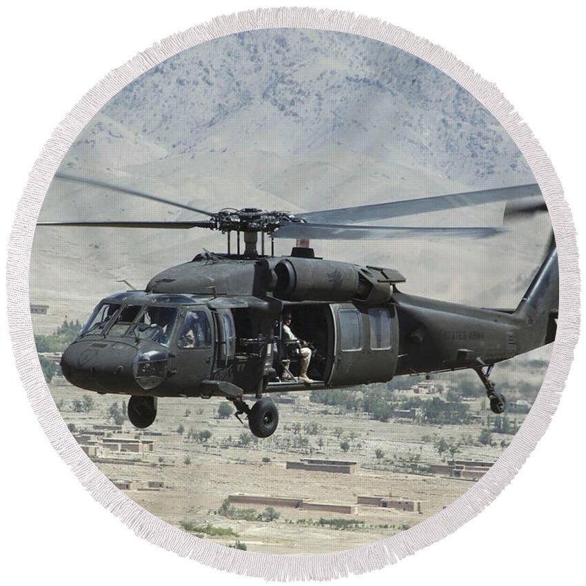 Horizontal Round Beach Towel featuring the photograph A Uh-60 Blackhawk Helicopter by Stocktrek Images