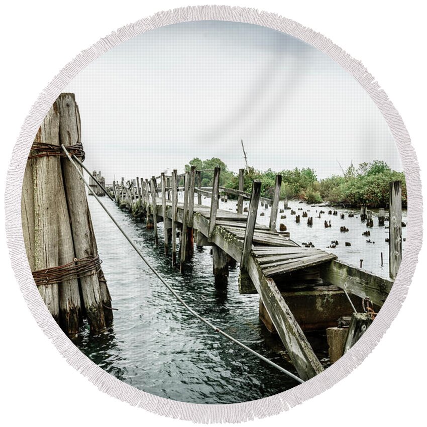 America Round Beach Towel featuring the photograph Abandoned pier by Alexey Stiop