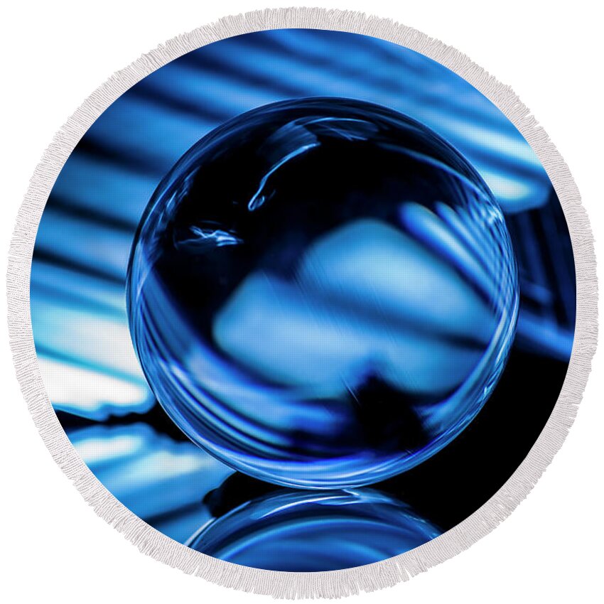 Blue Round Beach Towel featuring the photograph Abstract blue light painted glass ball by Sven Brogren