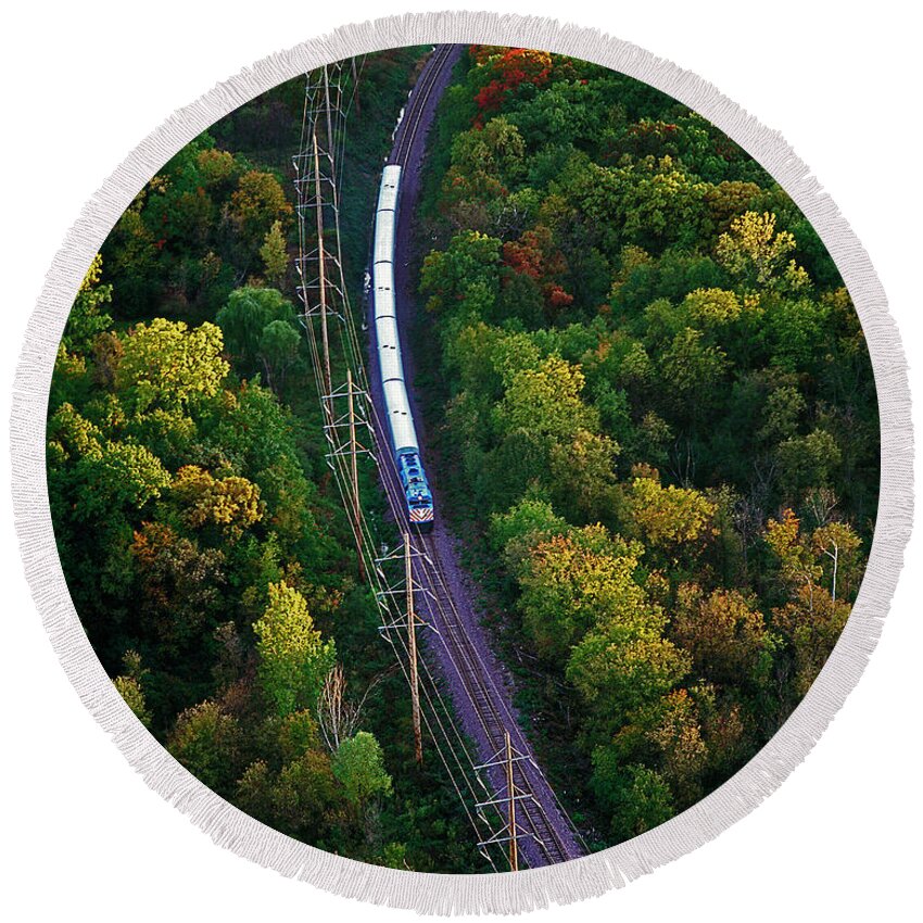 Aerial Round Beach Towel featuring the photograph Aerial of commuter train by Tom Jelen