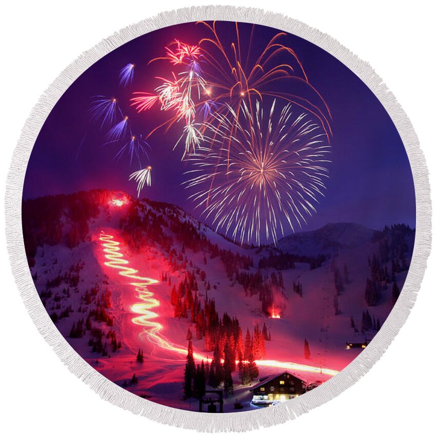 Alta Ski Utah Torchlight Fireworks Celebration Birthday Round Beach Towel featuring the photograph Alta Ski Area 75th Birthday Celebration by Brett Pelletier
