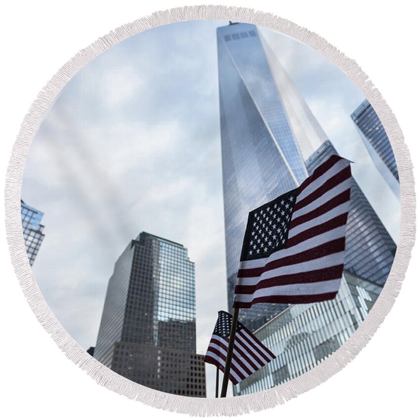 America Round Beach Towel featuring the photograph American flag in front of the One World World trade Center by Didier Marti