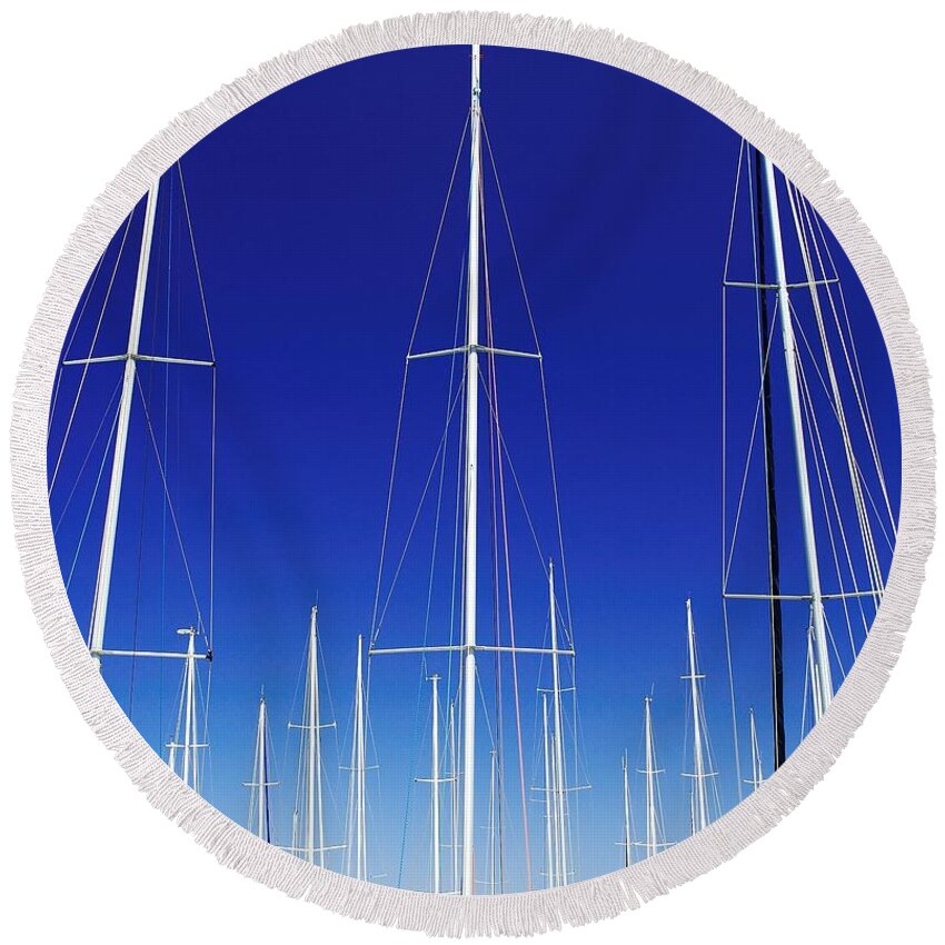 Australian Round Beach Towel featuring the photograph Artistic. Yacht Masts Reaching into a Vivid Blue Sky. by Geoff Childs