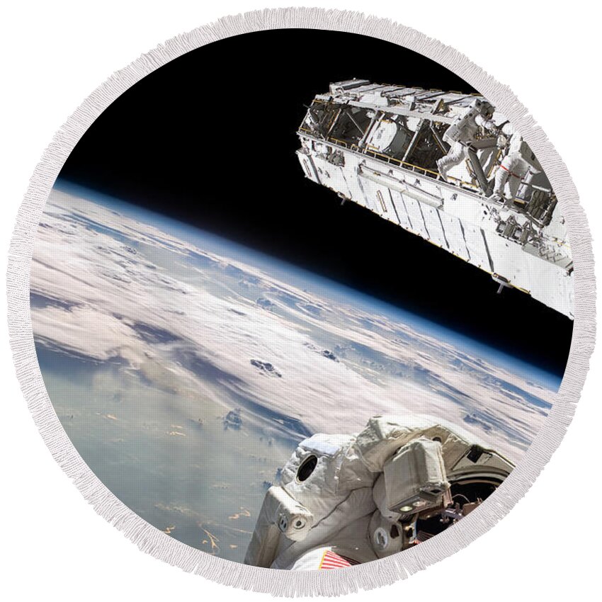 Astronaut Round Beach Towel featuring the photograph Astronauts Repair Space Station by Marc Ward
