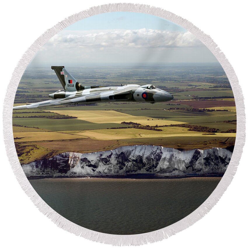 Avro Vulcan Round Beach Towel featuring the photograph Avro Vulcan over the white cliffs of Dover by Gary Eason