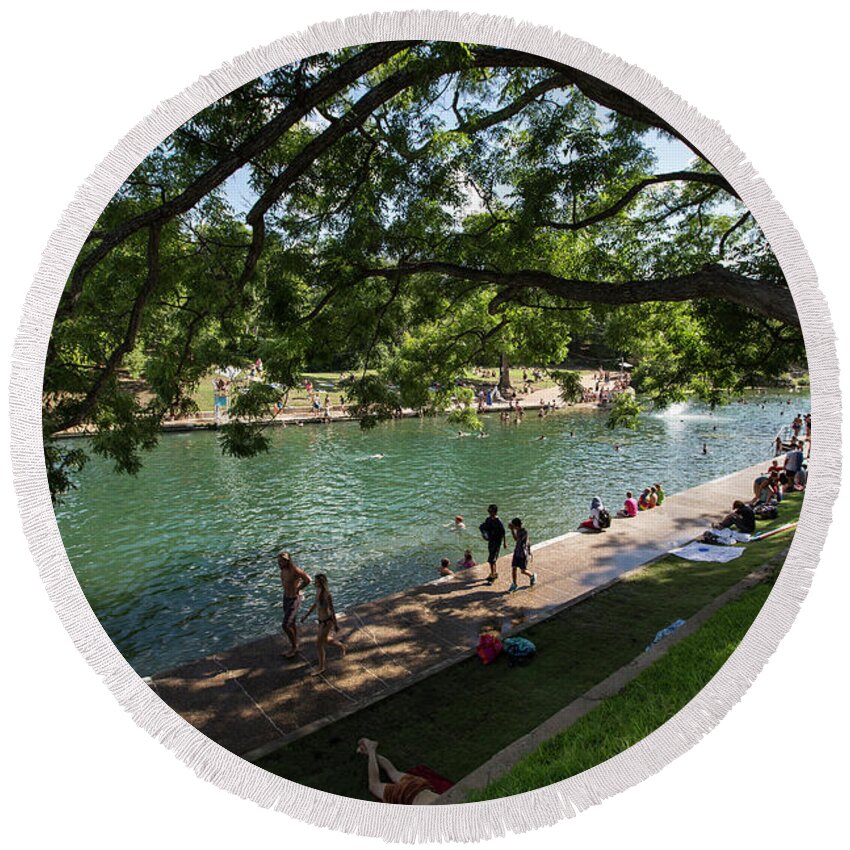 Barton Springs Pool Round Beach Towel featuring the photograph Barton Springs Pool is a shady grove of live oak trees dating ba by Dan Herron