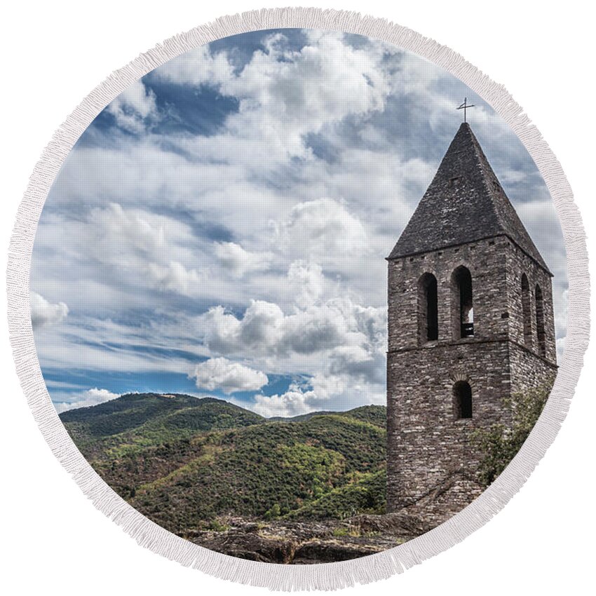 Ancient Round Beach Towel featuring the photograph Bell tower of the old church, Olargues France by Maria Heyens