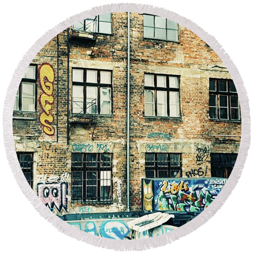 Berlin Round Beach Towel featuring the photograph Berlin house wall with graffiti by Nacho Vega