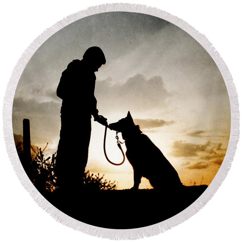 Boy Round Beach Towel featuring the photograph Boy and his dog by Clayton Bastiani