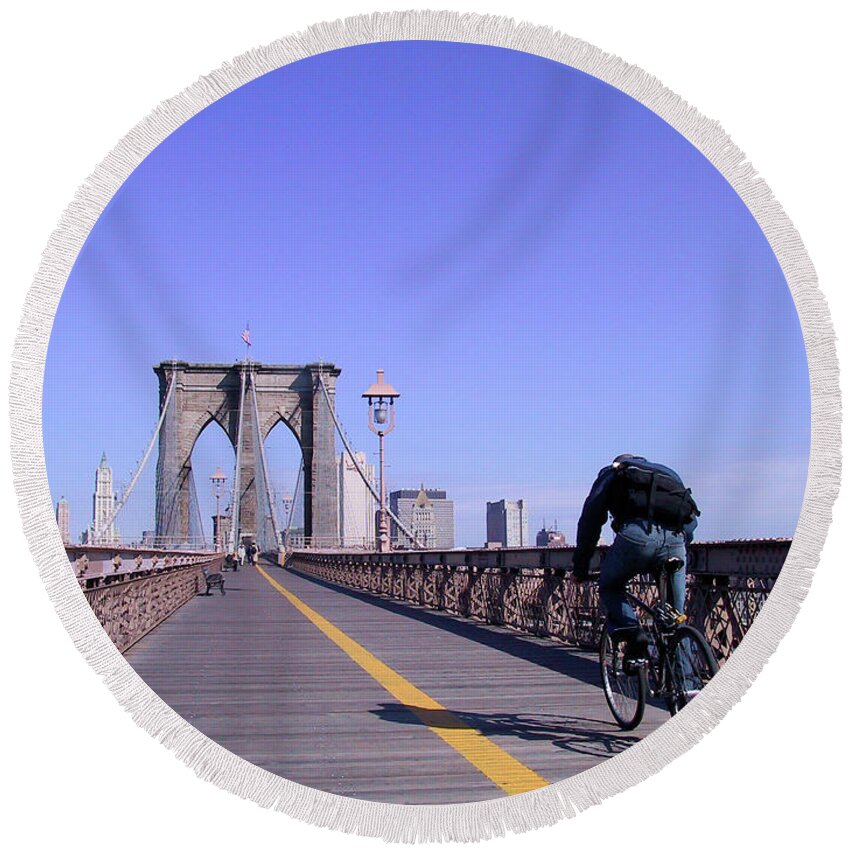 New York Round Beach Towel featuring the photograph Brooklyn Bridge Bicyclist by Frank DiMarco
