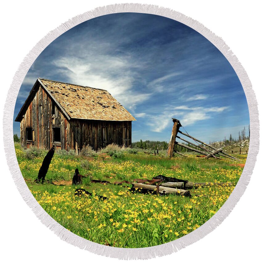 Rustic Round Beach Towel featuring the photograph Cabin In A Field Of Flowers by James Eddy