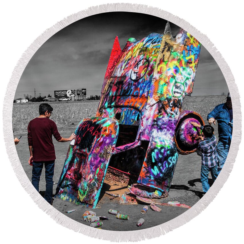 Landmark Round Beach Towel featuring the photograph Cadillac Ranch Spray Paint Fun along Historic Route 66 by Amarillo Texas by Randall Nyhof
