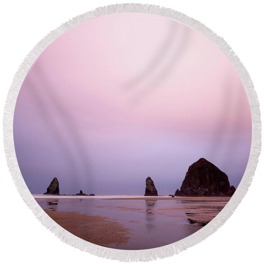 Nature Round Beach Towel featuring the photograph Cannon beach in the early morning blue light by Paul Quinn