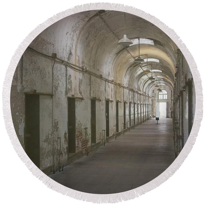 Eastern State Penitentiary Round Beach Towel featuring the photograph Cellblock Hallway by Tom Singleton