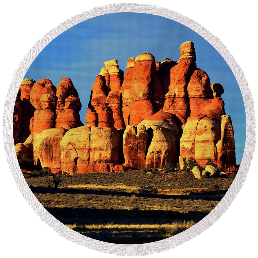 Canyonlands National Park Round Beach Towel featuring the photograph Chesler Park Sandstone Towers by Greg Norrell