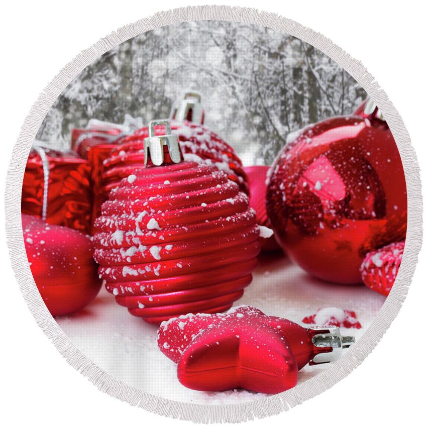 Christmas Round Beach Towel featuring the photograph Christmas Balls in Snow by Anastasy Yarmolovich