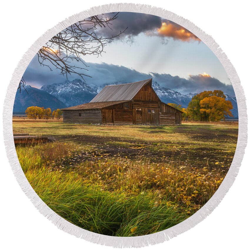 Sunset Round Beach Towel featuring the photograph Clearing Storm over Moulton Barn by Darren White