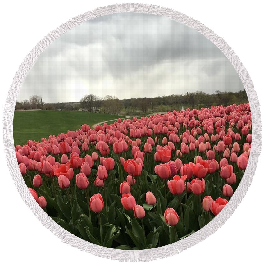 Coral Tulips In Forest Park In St. Louis Round Beach Towel featuring the photograph Cloudy With Coral Tulips by Nancy Koehler