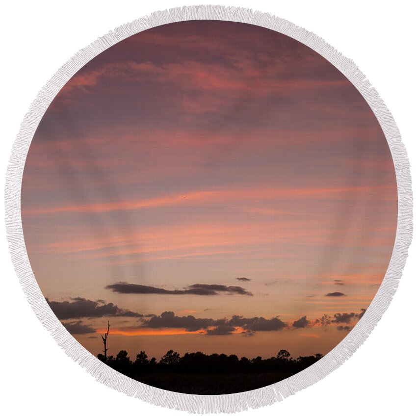 Colorful Round Beach Towel featuring the photograph Colorful sunset over the wetlands by David Watkins