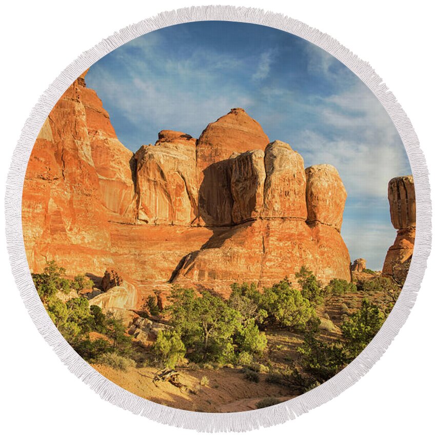 Canyonlands National Park Round Beach Towel featuring the photograph Colors of Chesler Park by Kunal Mehra