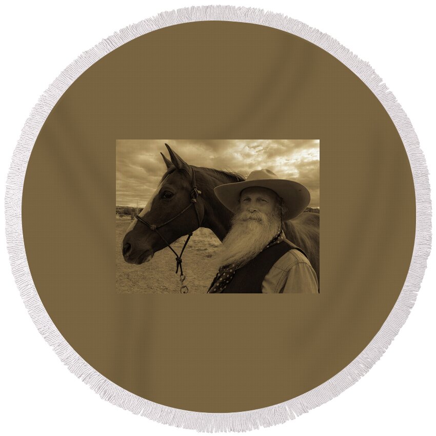 Cowboy Round Beach Towel featuring the photograph Cowboy and his Horse by Timothy Needham