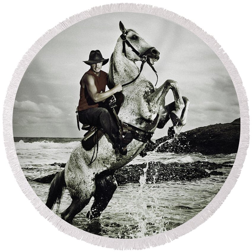 Horse Round Beach Towel featuring the photograph Cowboy on the rear up horse in the river by Dimitar Hristov