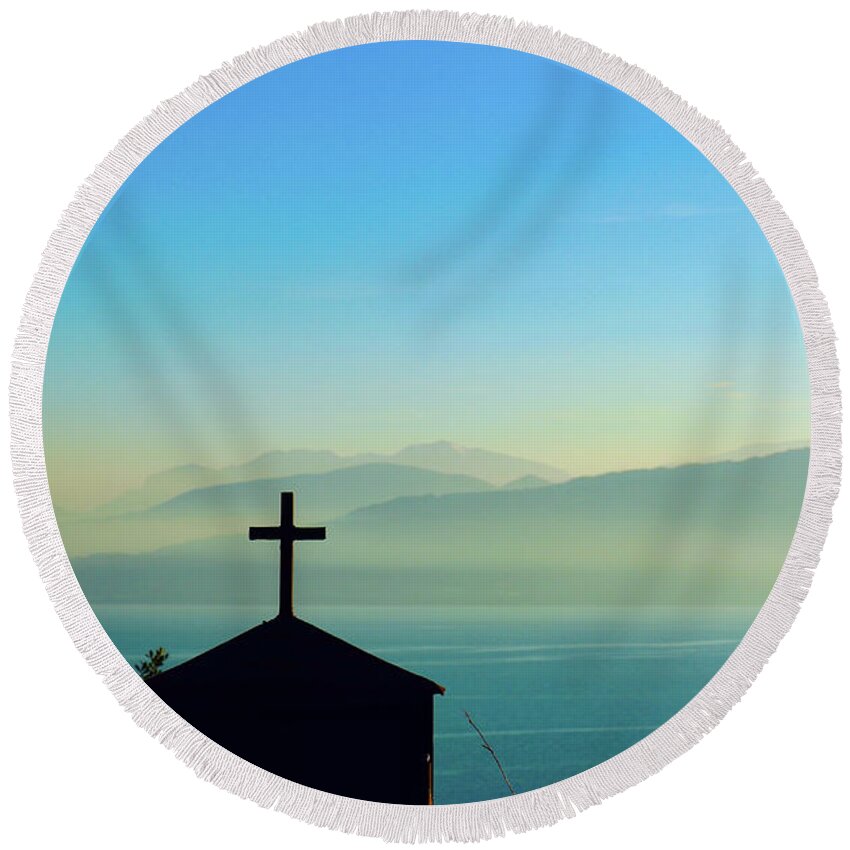 Landscape Round Beach Towel featuring the photograph Cross and foggy moutains in Greece by Susan Vineyard