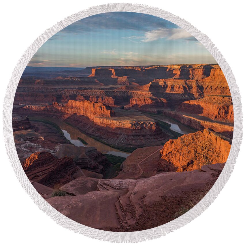 Dead Horse Point Round Beach Towel featuring the photograph Dead Horse Point Sunrise by Dan Norris