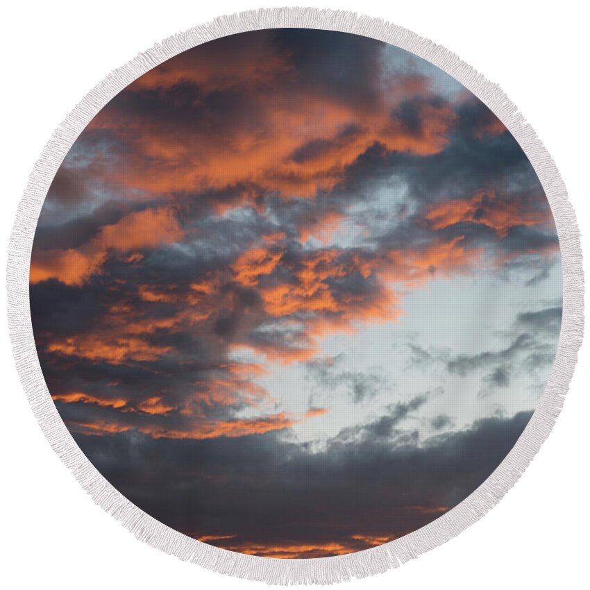 Stormy Clouds Round Beach Towel featuring the photograph Dramatic sunset sky with orange cloud colors by Michalakis Ppalis