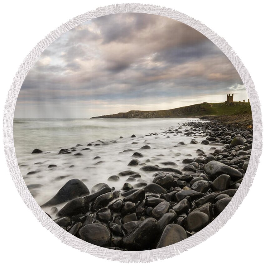 Coast Round Beach Towel featuring the photograph Dunstanburgh Castle sunset by Chris Smith