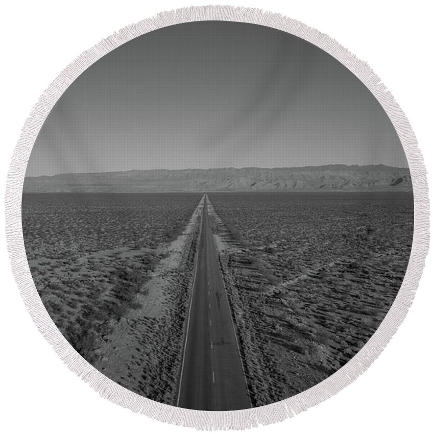 Endless Road Round Beach Towel featuring the photograph Endless Road Aerial BW by Michael Ver Sprill