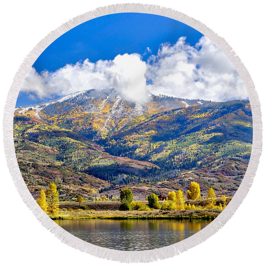 Landscape Round Beach Towel featuring the pyrography Fall Colors In Steamboat With a Lake. by James Steele