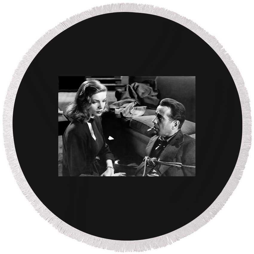 Film Noir Publicity Photo #2 Bogart And Bacall The Big Sleep 1945-46 Round Beach Towel featuring the photograph Film Noir Publicity Photo #2 Bogart And Bacall The Big Sleep 1945-46 by David Lee Guss