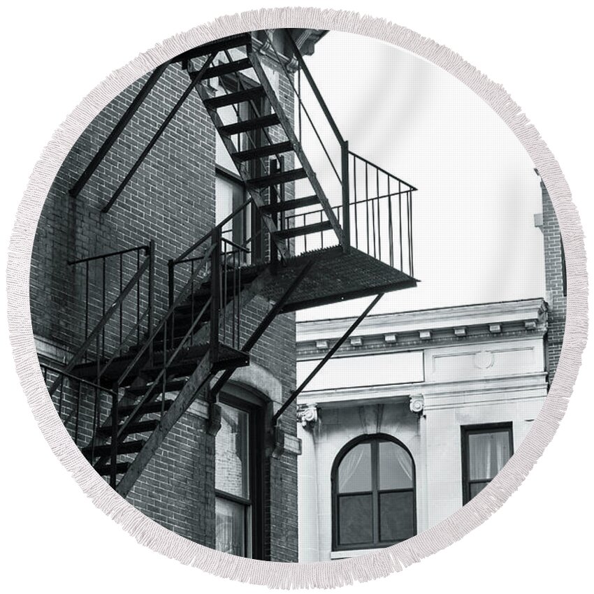 Stairs Round Beach Towel featuring the photograph Fire escape stairs by Jason Hughes