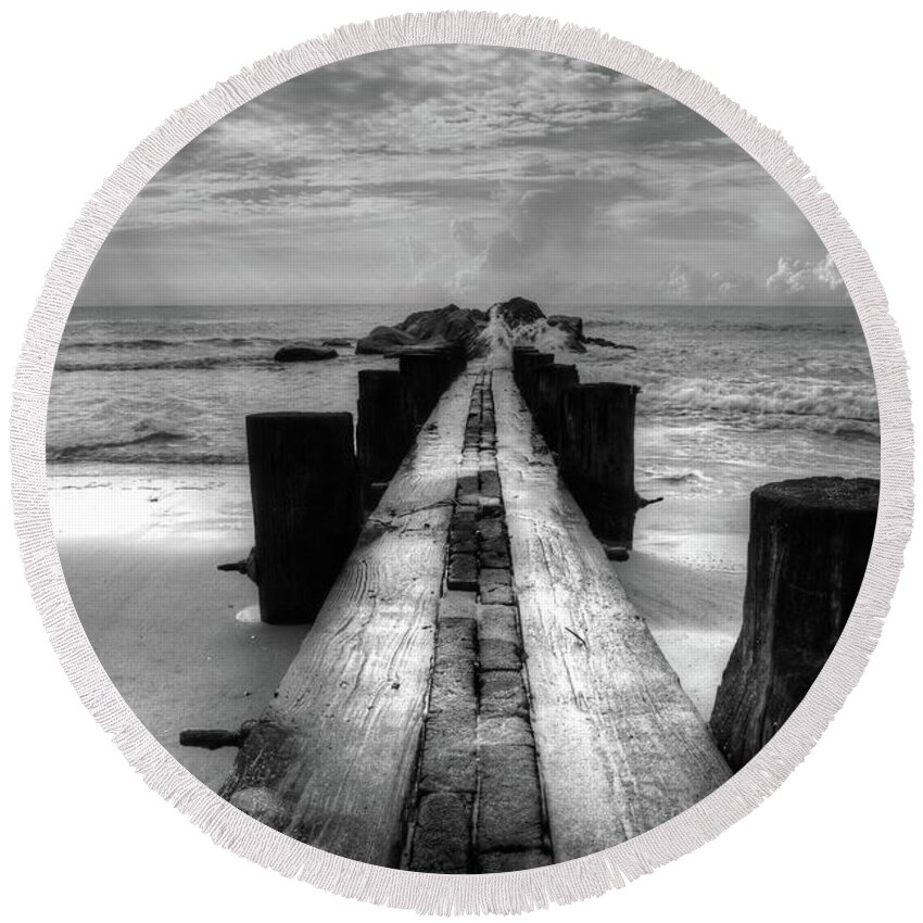 Folly Beach Pilings Round Beach Towel featuring the photograph Folly Beach Pilings Charleston South Carolina In Black and White by Carol Montoya