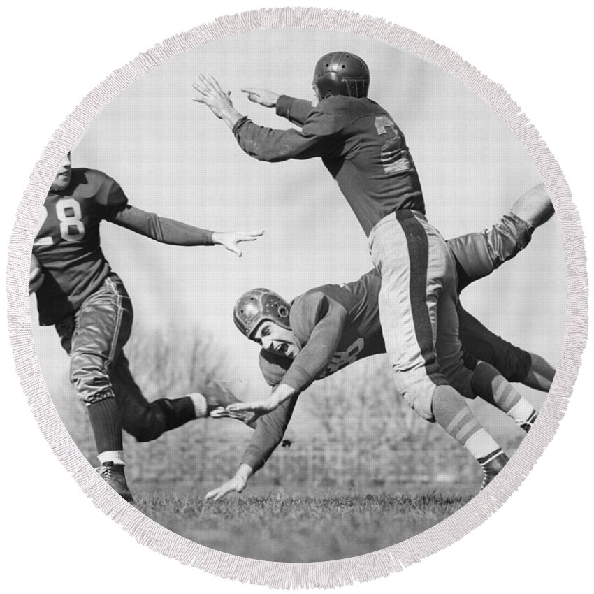 1940s Round Beach Towel featuring the photograph Football Action Shot, C.1940s by H. Armstrong Roberts/ClassicStock