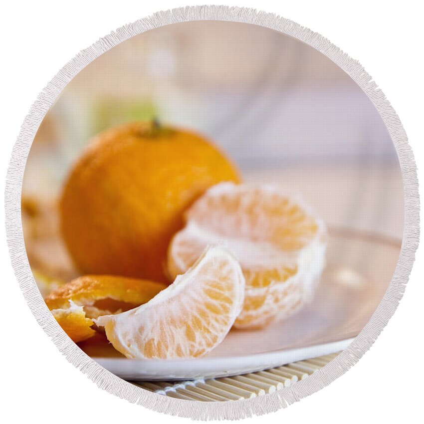 Orange Round Beach Towel featuring the photograph Freshly peeled citrus by Cindy Garber Iverson