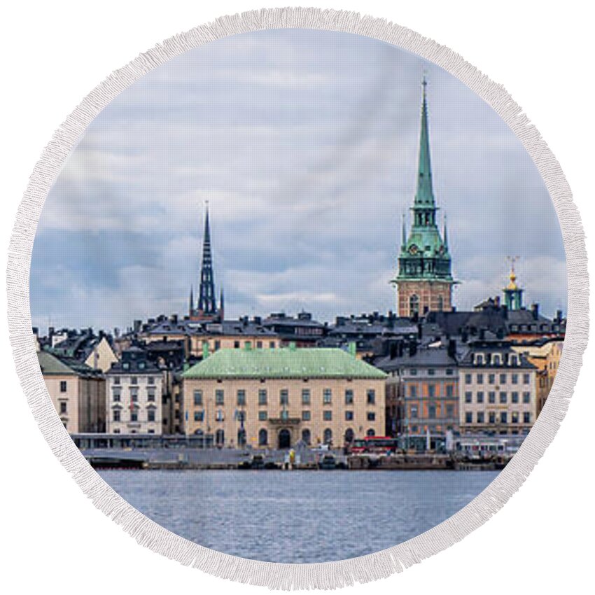 Gamla Stan Stockholm's Entrance By The Sea Round Beach Towel featuring the photograph Gamla Stan Stockholm's entrance by the sea by Torbjorn Swenelius