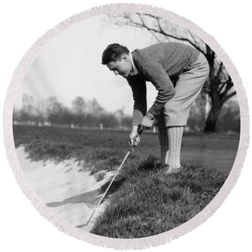 1930s Round Beach Towel featuring the photograph Golfer Playing Ball In Sand Trap by H. Armstrong Roberts/ClassicStock