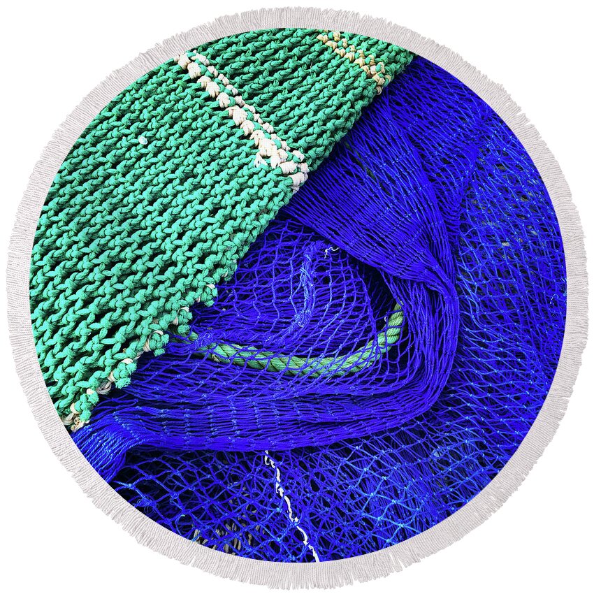 Fishing Round Beach Towel featuring the photograph Green and blue fishing nets by GoodMood Art