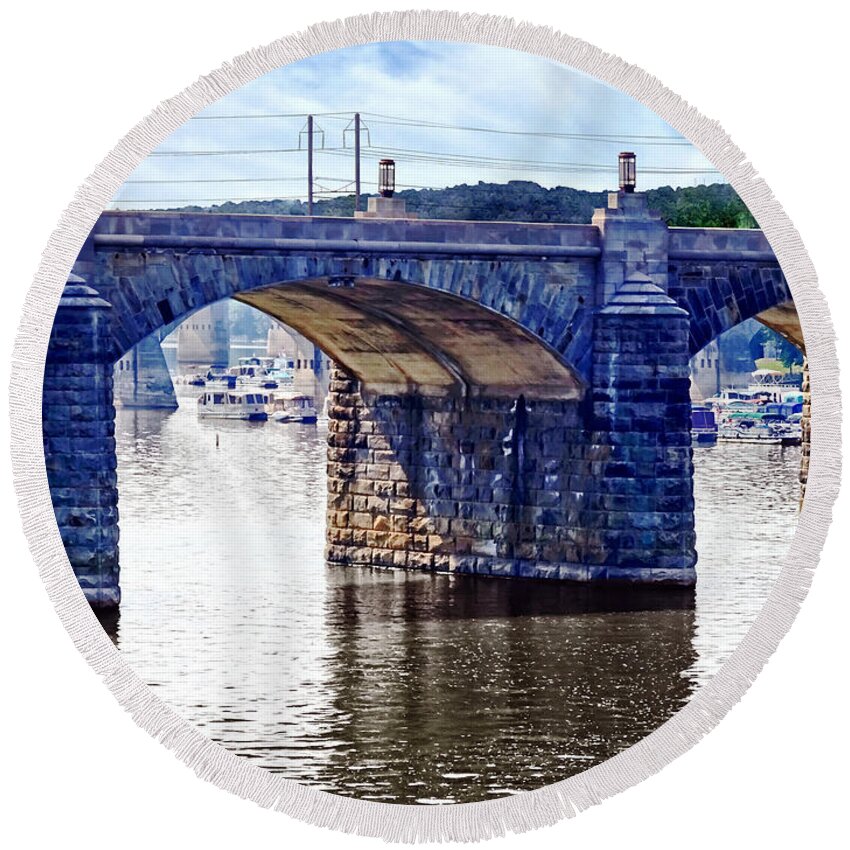 I Saw This View Of The Market Street Bridge From The Walnut Street Pedestrian Bridge. The Market Street Bridge Goes From Downtown Harrisburg To City Island Known For Entertainment And Sporting Events. You Can See The City Island Marina Through The Arches Of The Bridge. Round Beach Towel featuring the photograph Harrisburg PA - Market Street Bridge by Susan Savad