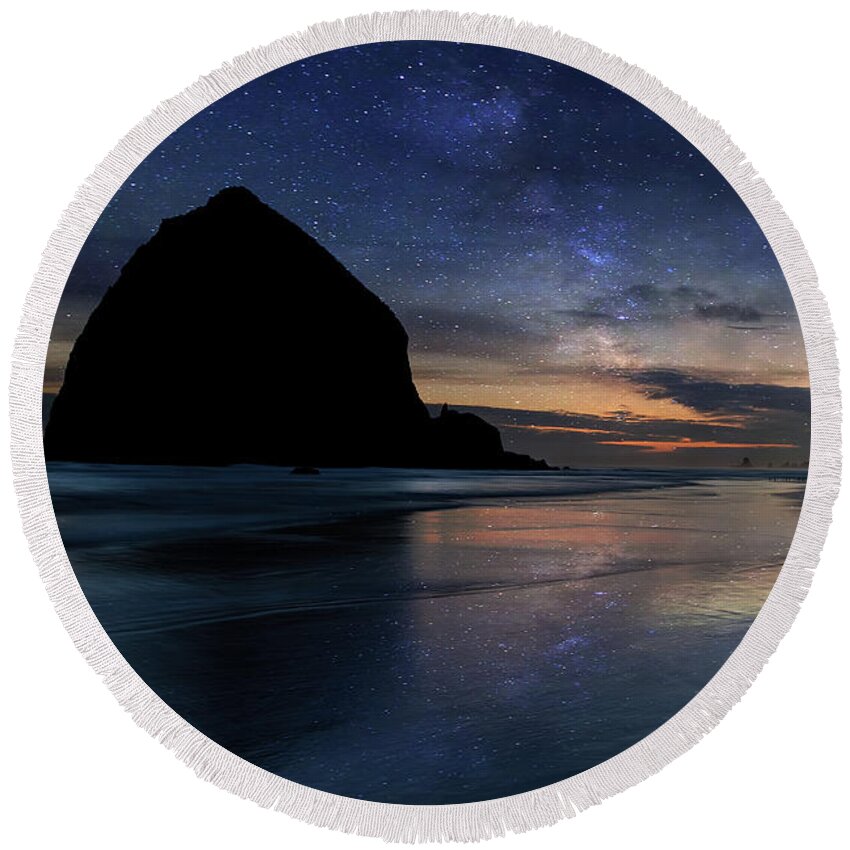 Haystack Rock Round Beach Towel featuring the photograph Haystack Rock under Starry Night Sky by David Gn