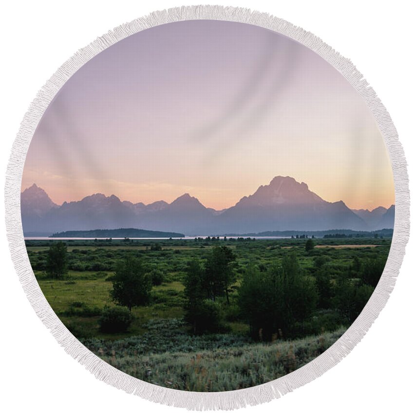 Grand Tetons Round Beach Towel featuring the photograph Hazy Sunset in the Tetons by Margaret Pitcher