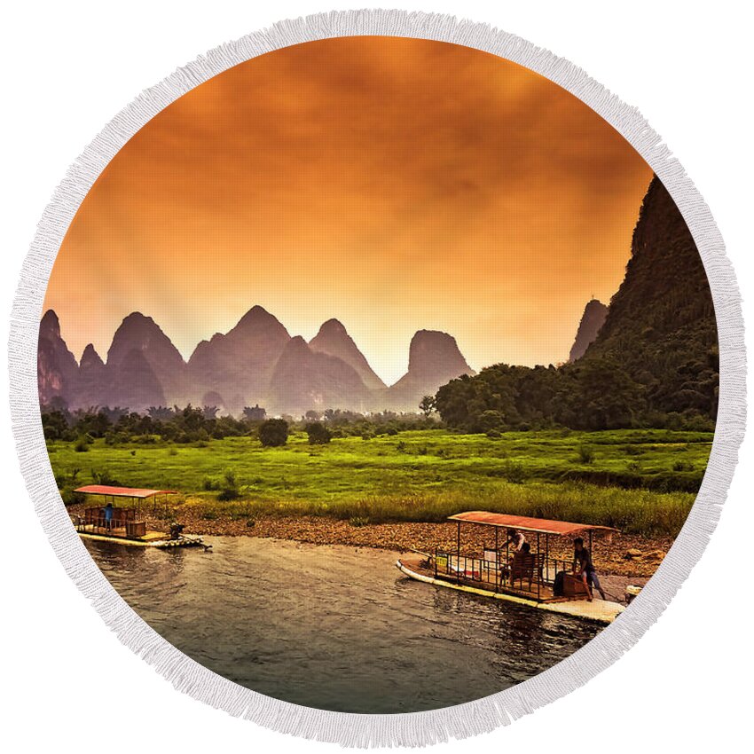 Sunset Round Beach Towel featuring the photograph Home boat in red evening glow-China Guilin scenery Lijiang River in Yangshuo by Artto Pan