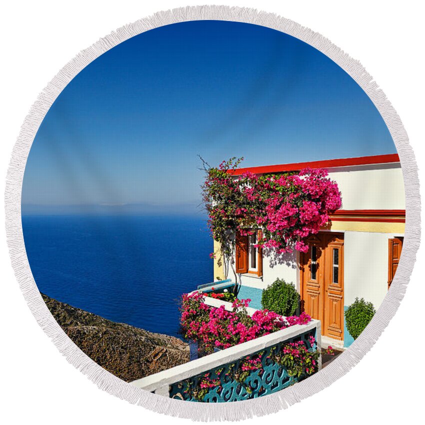 House Round Beach Towel featuring the photograph House of the village Olympos in Karpathos - Greece by Constantinos Iliopoulos
